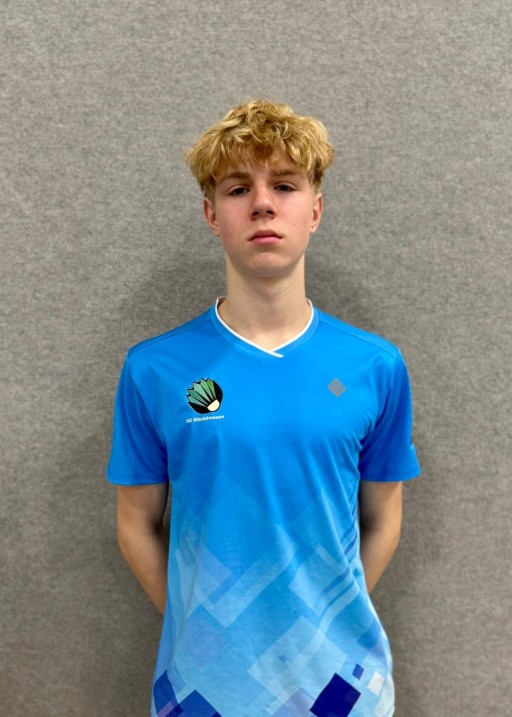 Sportler im blauen Trikot der SG Rheinhessen vor grauem Hintergrund